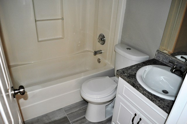 48 Ramsey Road Phenix City, AL 36869 - Photo 21 of 23 a bathroom with a sink toilet and shower