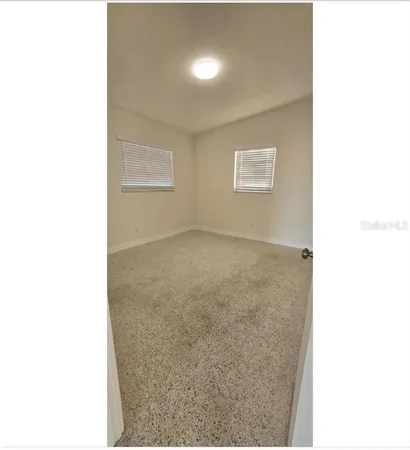 a view of a room with a hallway