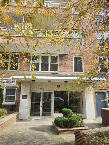 front view of a building with a street