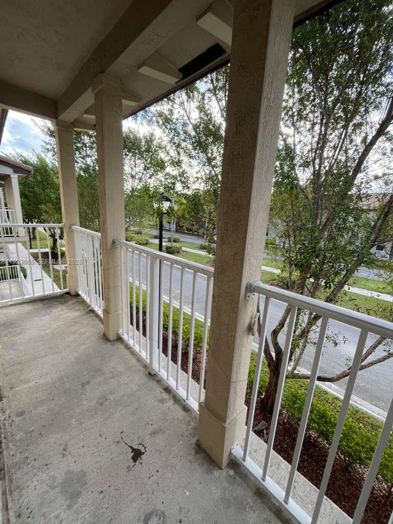 11665 Southwest 244 Street, Unit 116 Homestead, FL 33032 - Photo 18 of 32 a view of an outdoor space