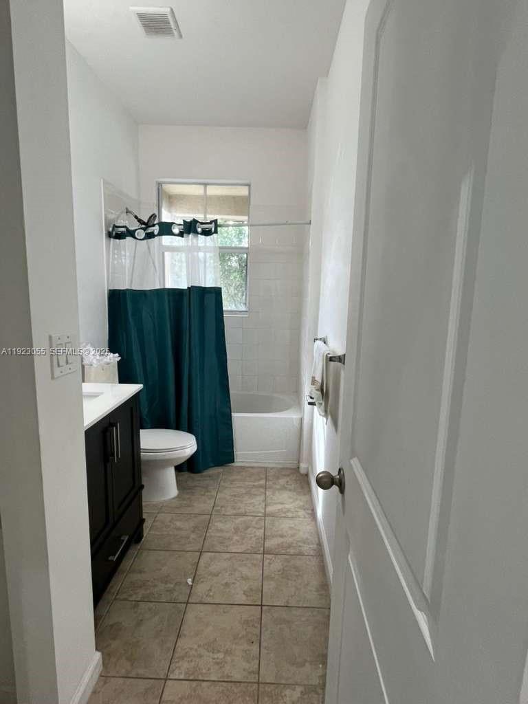 11665 Southwest 244 Street, Unit 116 Homestead, FL 33032 - Photo 26 of 32 a bathroom with a sink and toilet