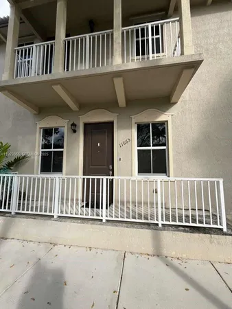 a view of a house with a deck