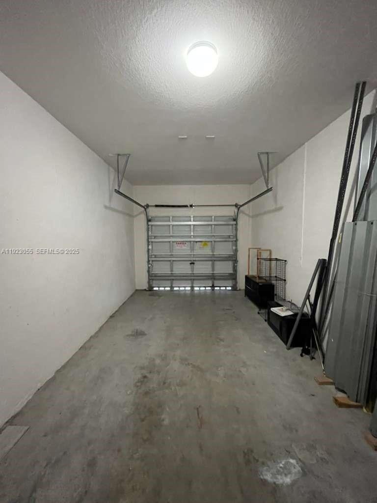 11665 Southwest 244 Street, Unit 116 Homestead, FL 33032 - Photo 4 of 32 a view of empty room