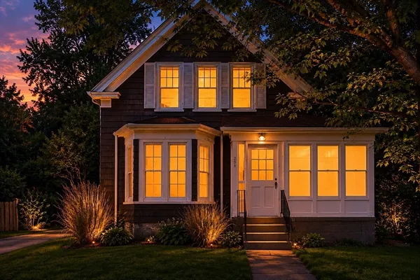 a front view of a house with a yard