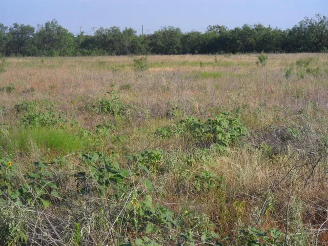 a view of outdoor space and a lake view