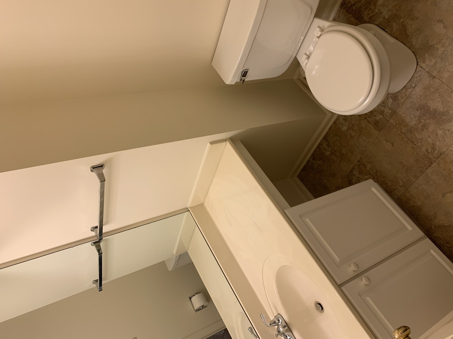 17888 Braewick Road Gurnee, IL 60031 - Photo 15 of 16 a bathroom with a sink and a mirror