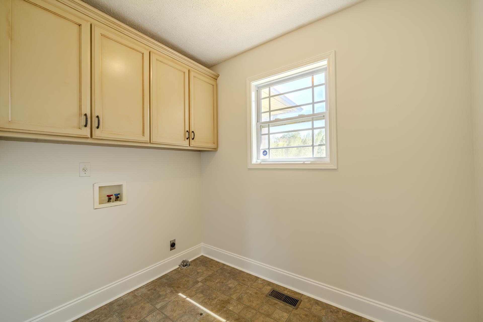 200 Boyd Road Adamsville, TN 38310 - Photo 15 of 26 a view of a room with rack on the wall and a window