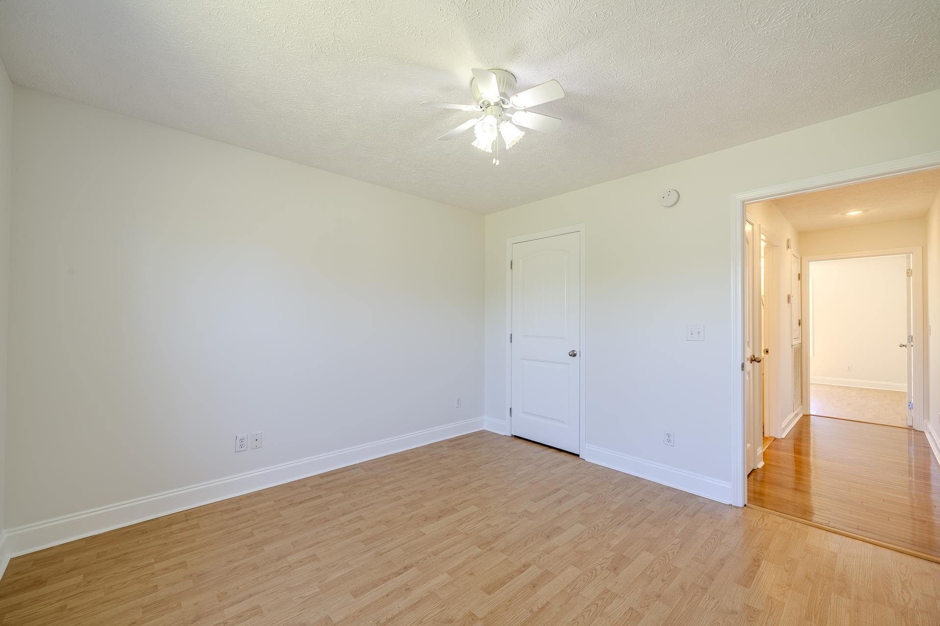200 Boyd Road Adamsville, TN 38310 - Photo 16 of 26 wooden floor in an empty room