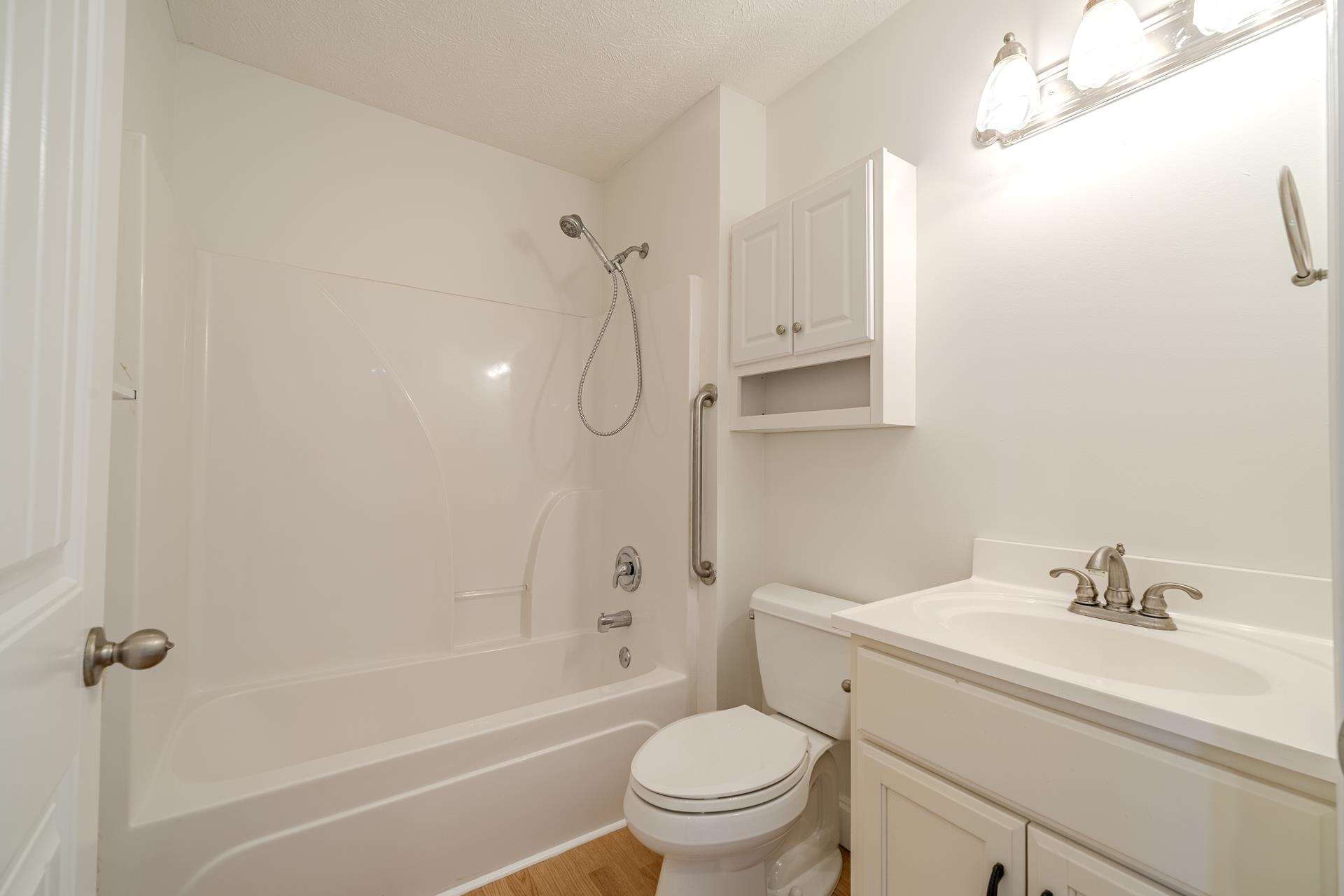 200 Boyd Road Adamsville, TN 38310 - Photo 17 of 26 a bathroom with a sink toilet and shower