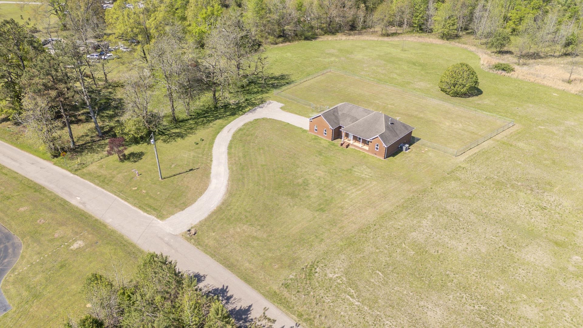 200 Boyd Road Adamsville, TN 38310 - Photo 19 of 26 a view of a swimming pool with a yard