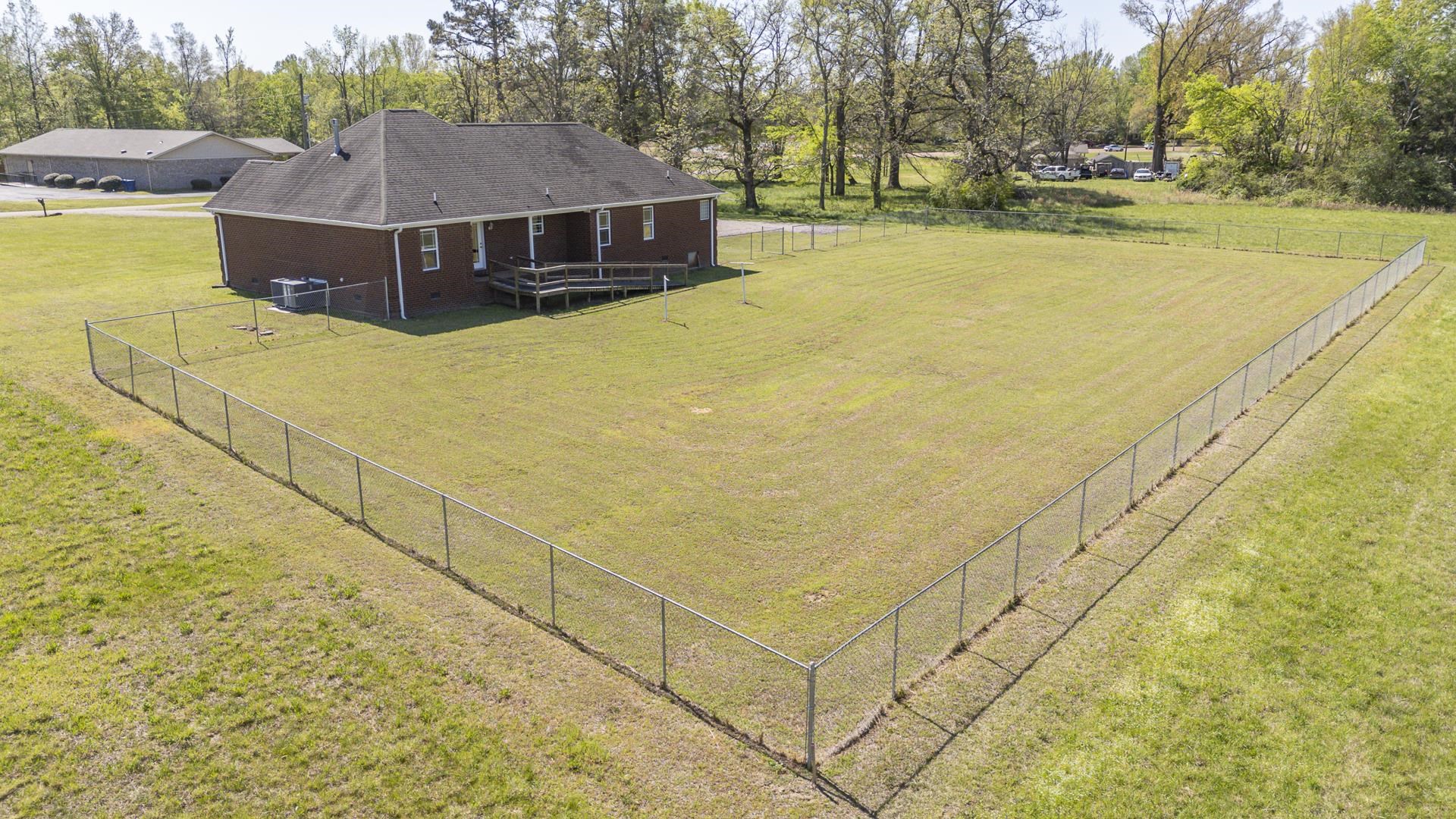 200 Boyd Road Adamsville, TN 38310 - Photo 20 of 26 a view of a swimming pool with an outdoor space