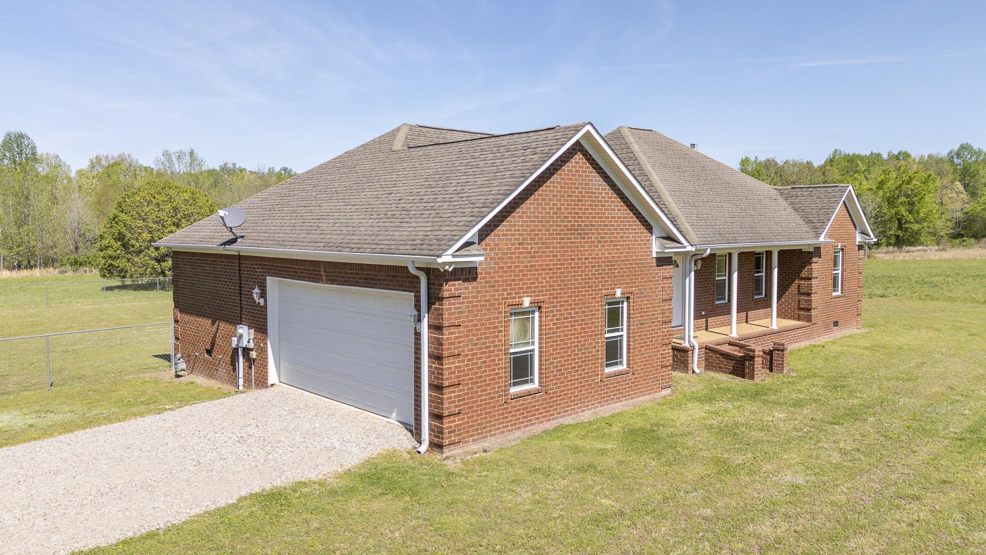 200 Boyd Road Adamsville, TN 38310 - Photo 25 of 26 a front view of a house with garden
