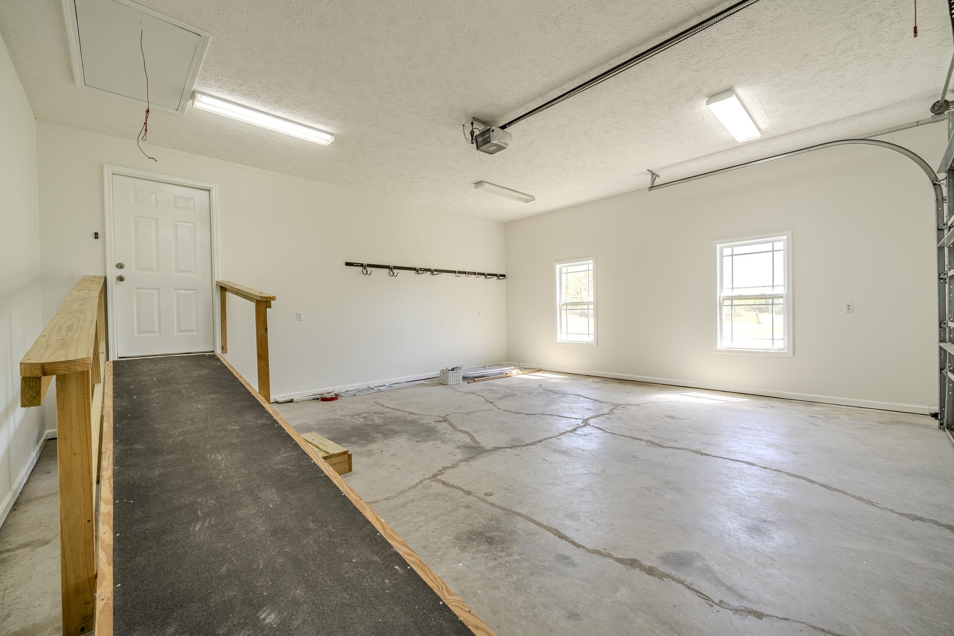 200 Boyd Road Adamsville, TN 38310 - Photo 26 of 26 a view of a big room with closet and windows