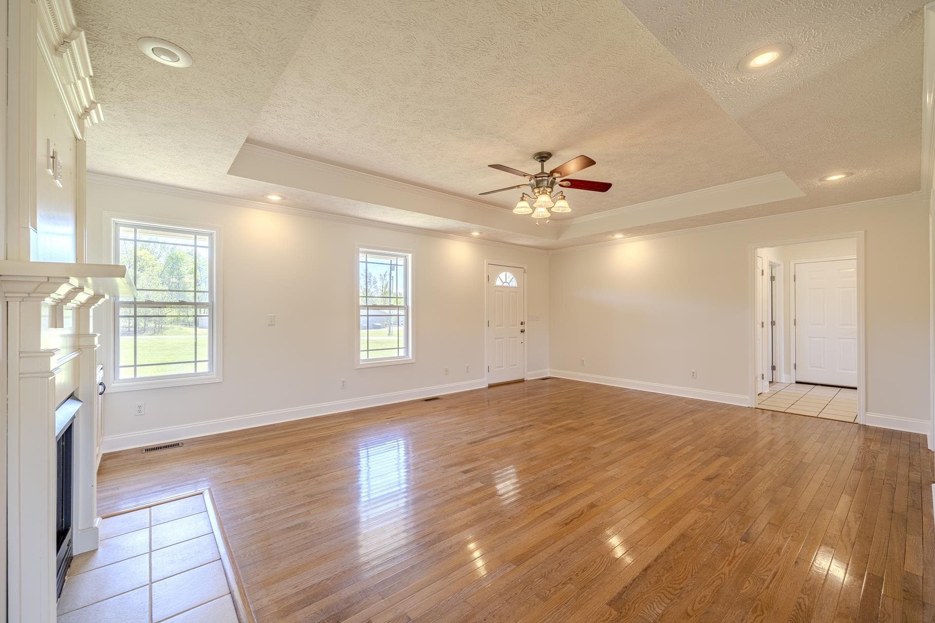 200 Boyd Road Adamsville, TN 38310 - Photo 5 of 26 an empty room with fan and windows