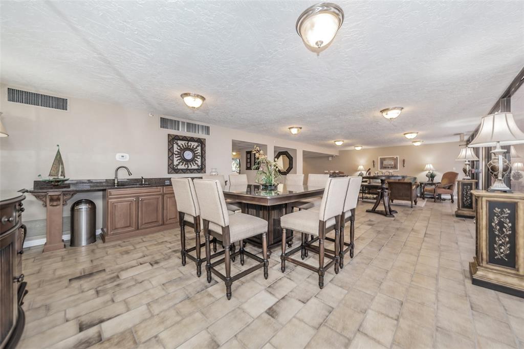 17940 Gulf Boulevard, Unit 7B Redington Shores, FL 33708 - Photo 11 of 58 a view of a dining area with furniture