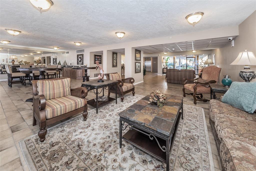 17940 Gulf Boulevard, Unit 7B Redington Shores, FL 33708 - Photo 12 of 58 a living room with furniture and wooden floor