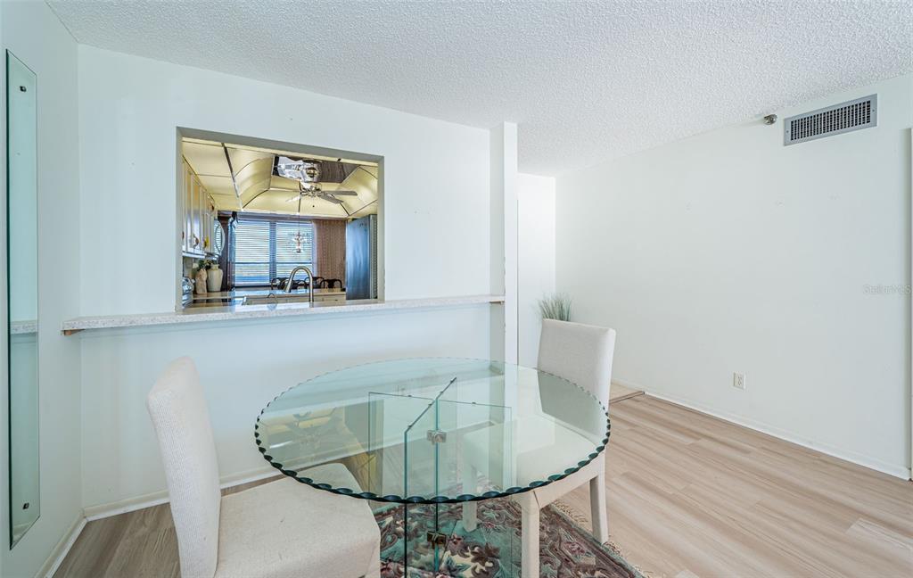 17940 Gulf Boulevard, Unit 7B Redington Shores, FL 33708 - Photo 26 of 58 a living room with furniture and a fireplace