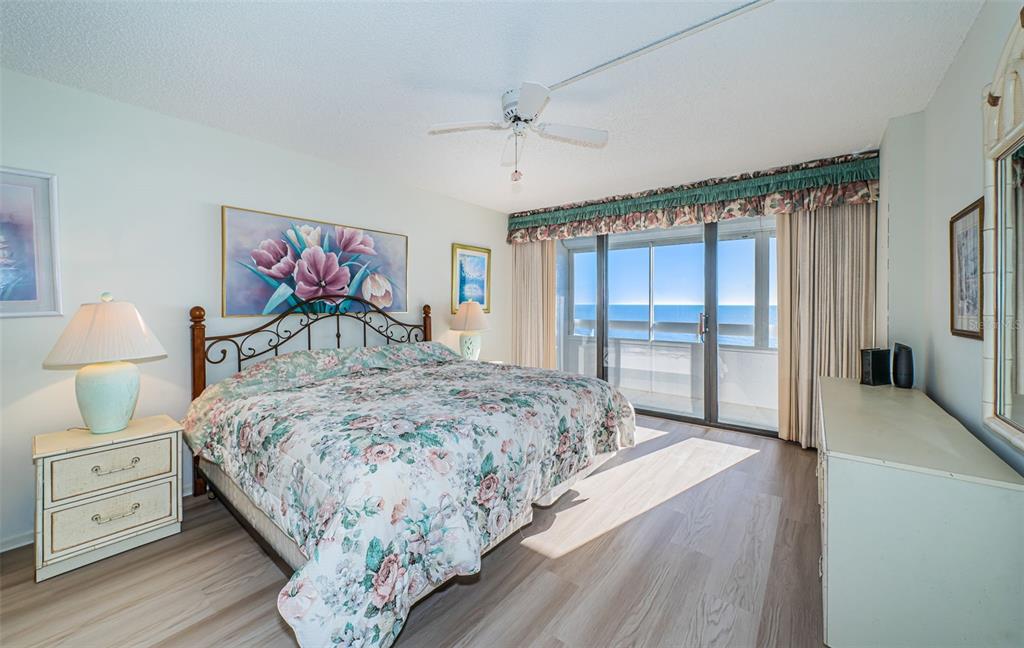 17940 Gulf Boulevard, Unit 7B Redington Shores, FL 33708 - Photo 34 of 58 a bedroom with a bed and a large window