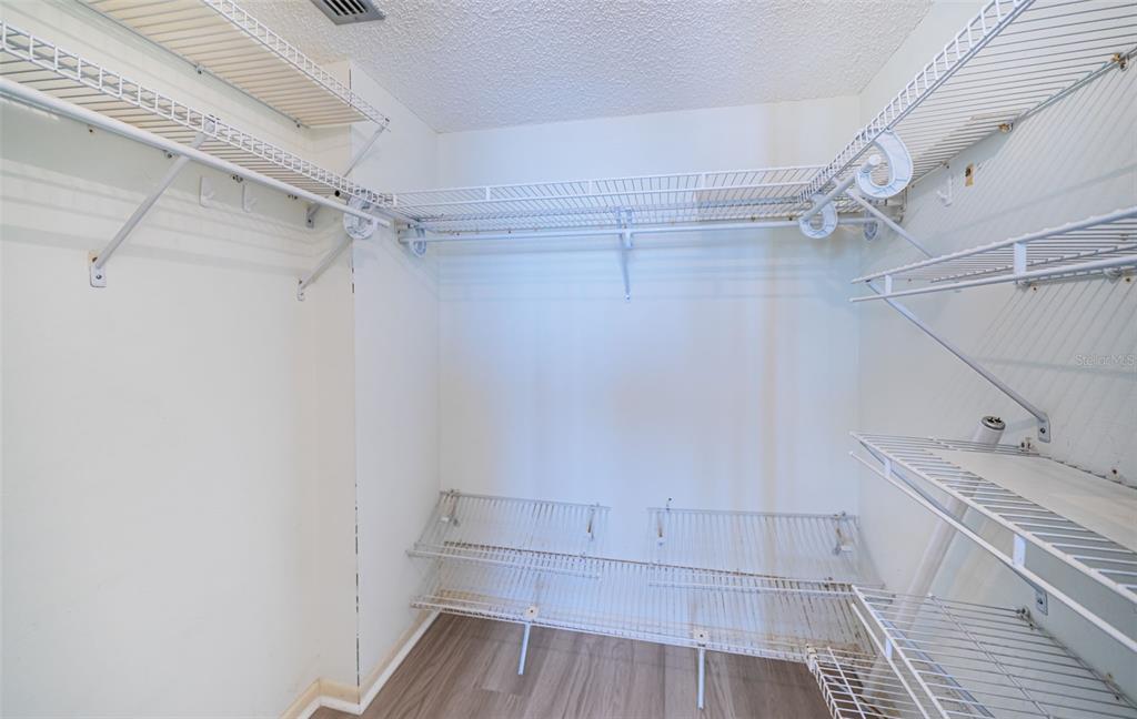 17940 Gulf Boulevard, Unit 7B Redington Shores, FL 33708 - Photo 38 of 58 a bathroom with a sink and shower