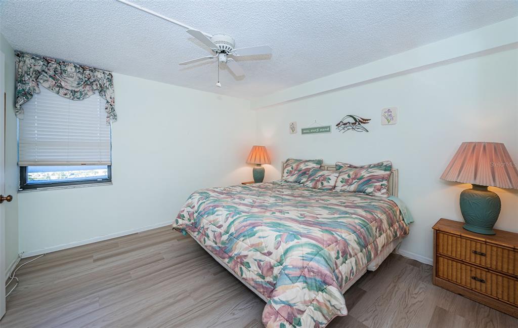 17940 Gulf Boulevard, Unit 7B Redington Shores, FL 33708 - Photo 40 of 58 a bedroom with bed and window