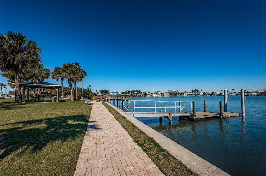 17940 Gulf Boulevard, Unit 7B Redington Shores, FL 33708 - Photo 56 of 58 a view of a lake with a garden
