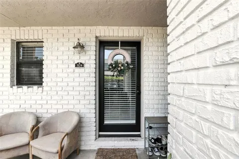 a front view of a house with outdoor space