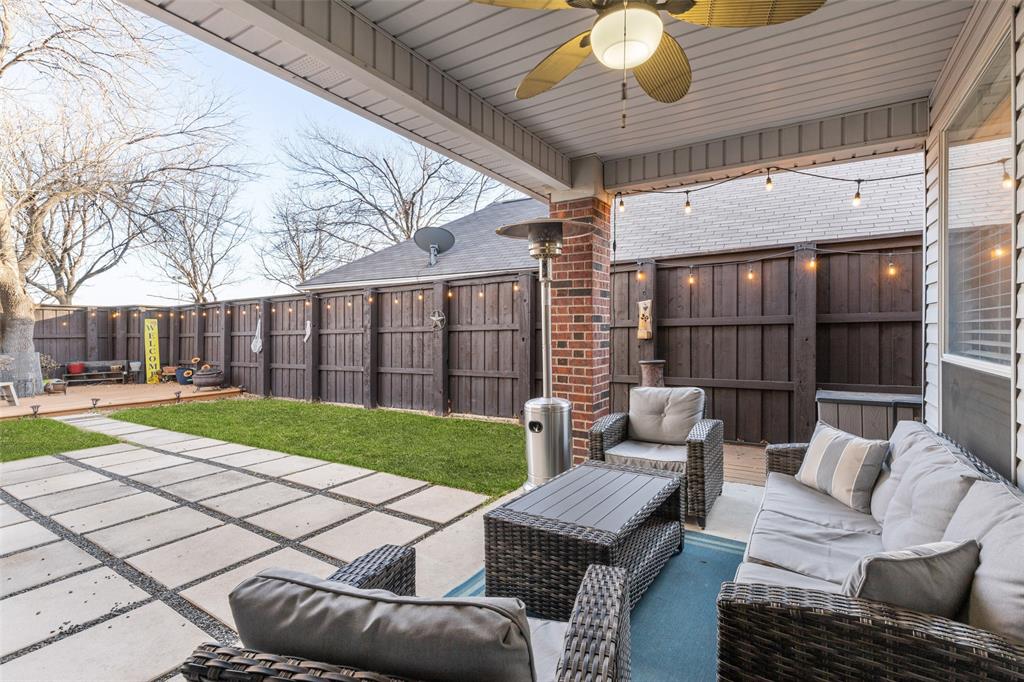 18212 Muir Circle Dallas, TX 75287 - Photo 11 of 13 a view of a patio with couches and a fire pit