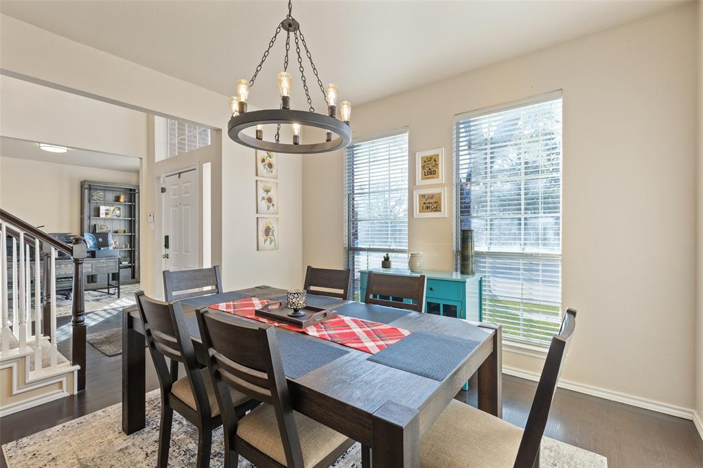 18212 Muir Circle Dallas, TX 75287 - Photo 4 of 13 a view of a dining room with furniture window and wooden floor