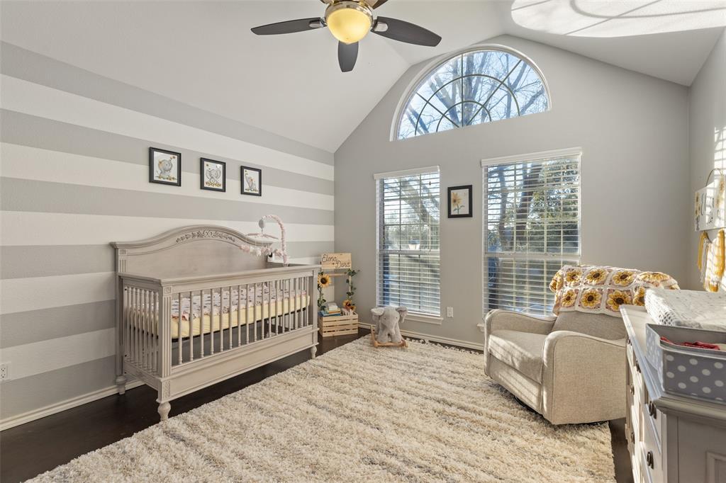 18212 Muir Circle Dallas, TX 75287 - Photo 10 of 13 a bedroom with furniture and a window