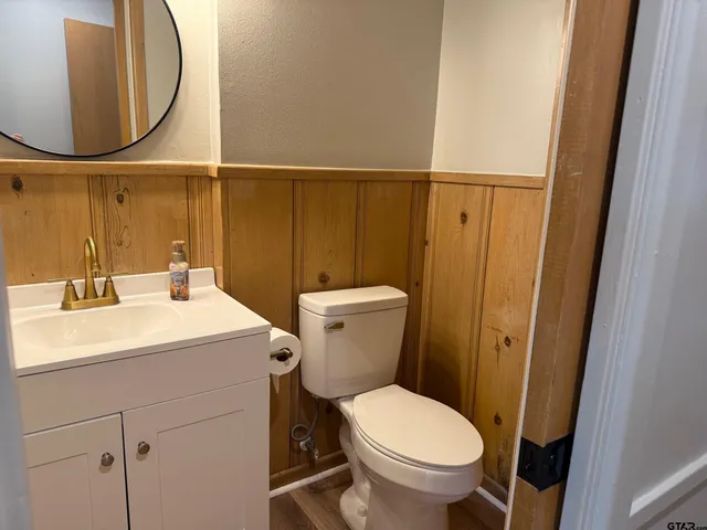 a bathroom with a sink and mirror