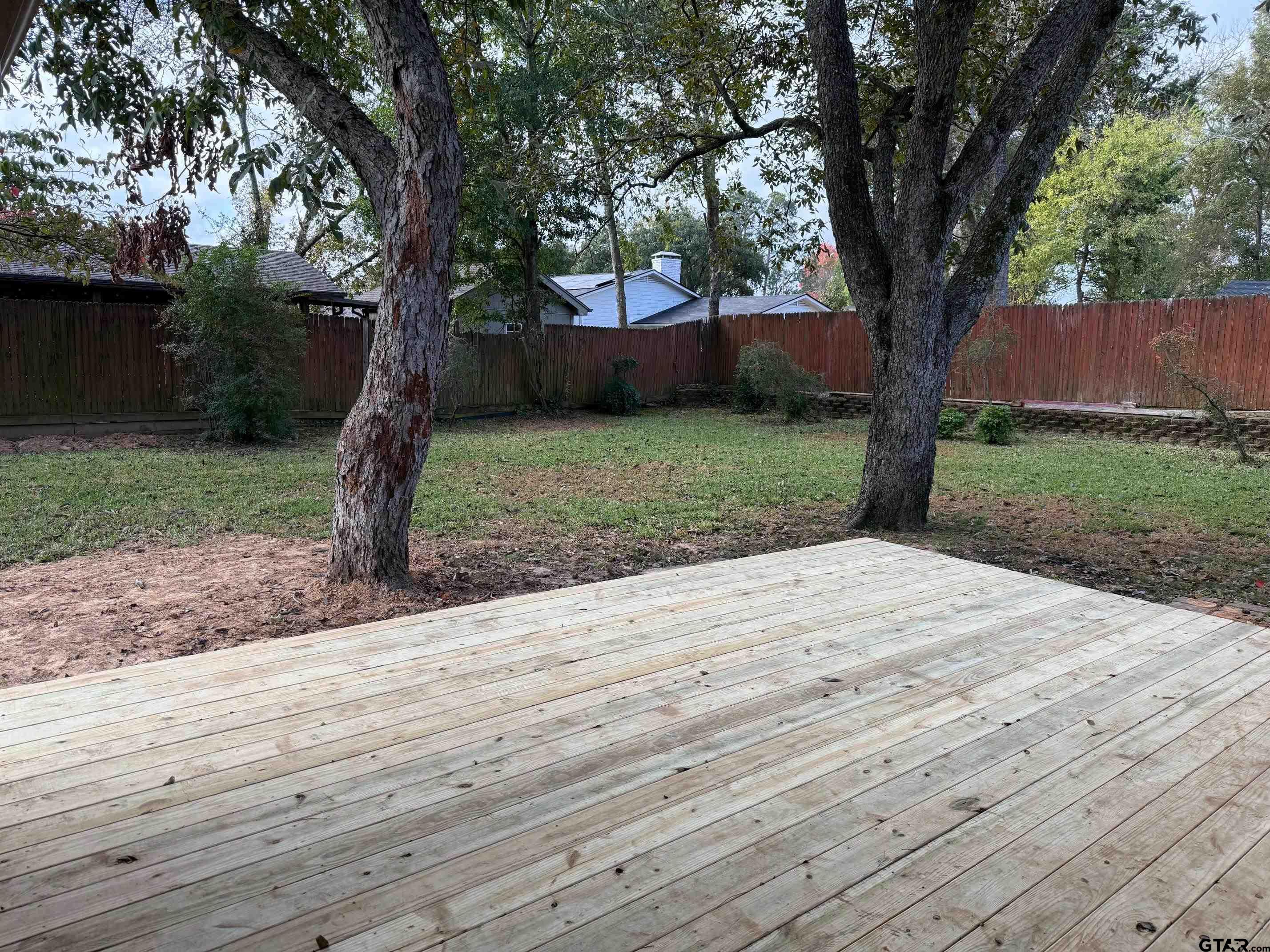 301 Ridgecrest Drive Tyler, TX 75701 - Photo 24 of 27 a view of a backyard