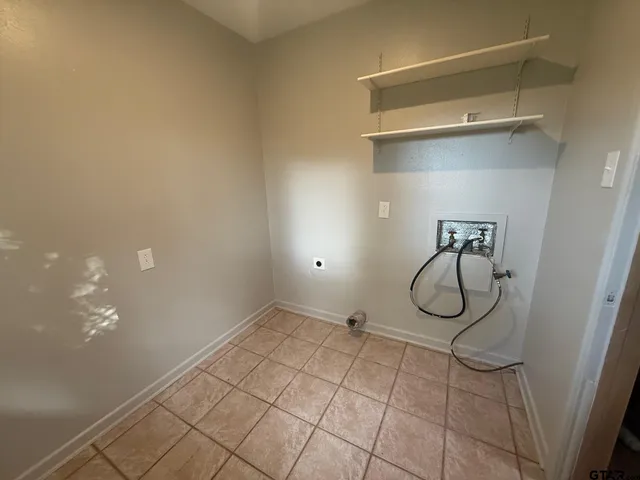 a kitchen with a stove and a microwave