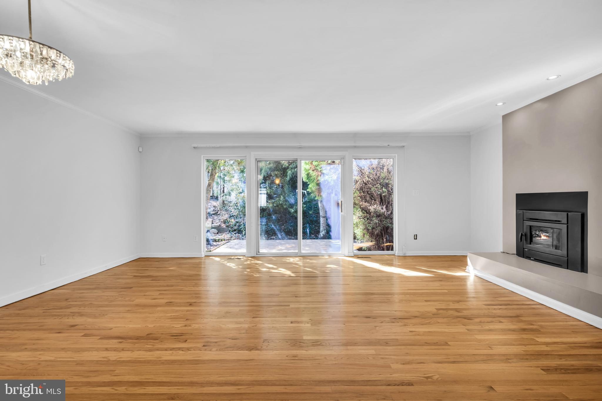 32 Gordon Way Princeton, NJ 08540 - Photo 5 of 35 Patio doors and wood burning fireplace