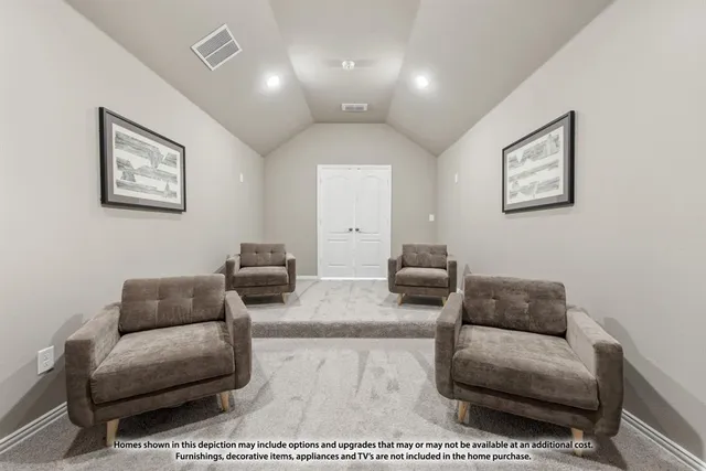 a living room with furniture and a couch