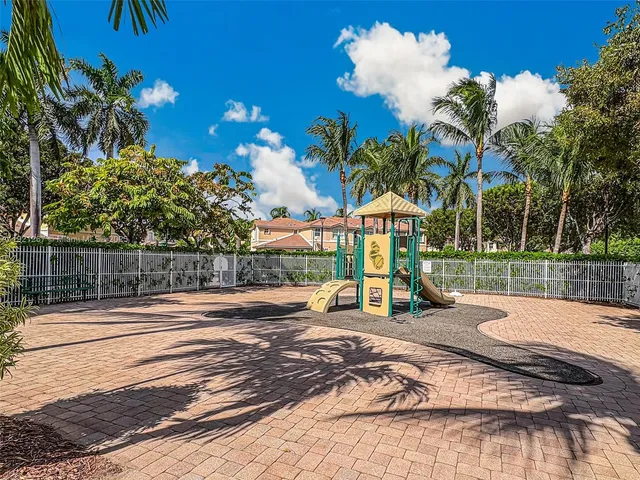 an aerial view of residential houses and city street