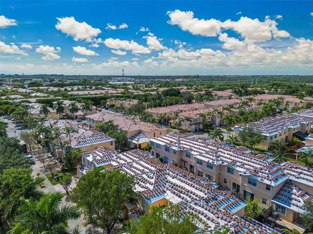 a view of a city with lawn chairs