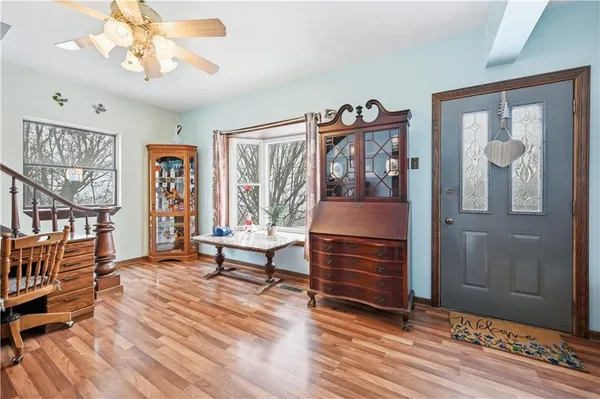 a bedroom with furniture and window