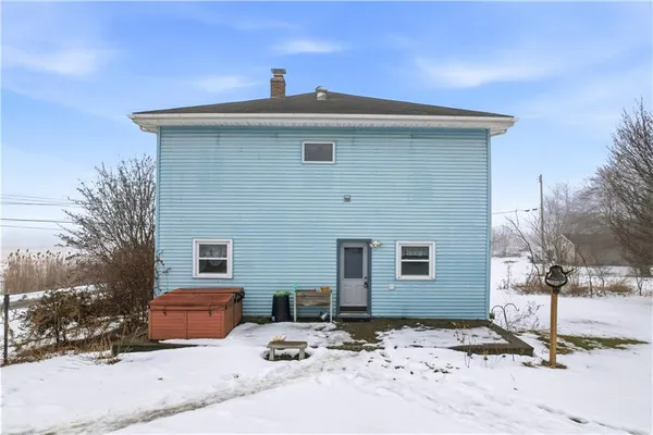 a front view of a house with yard