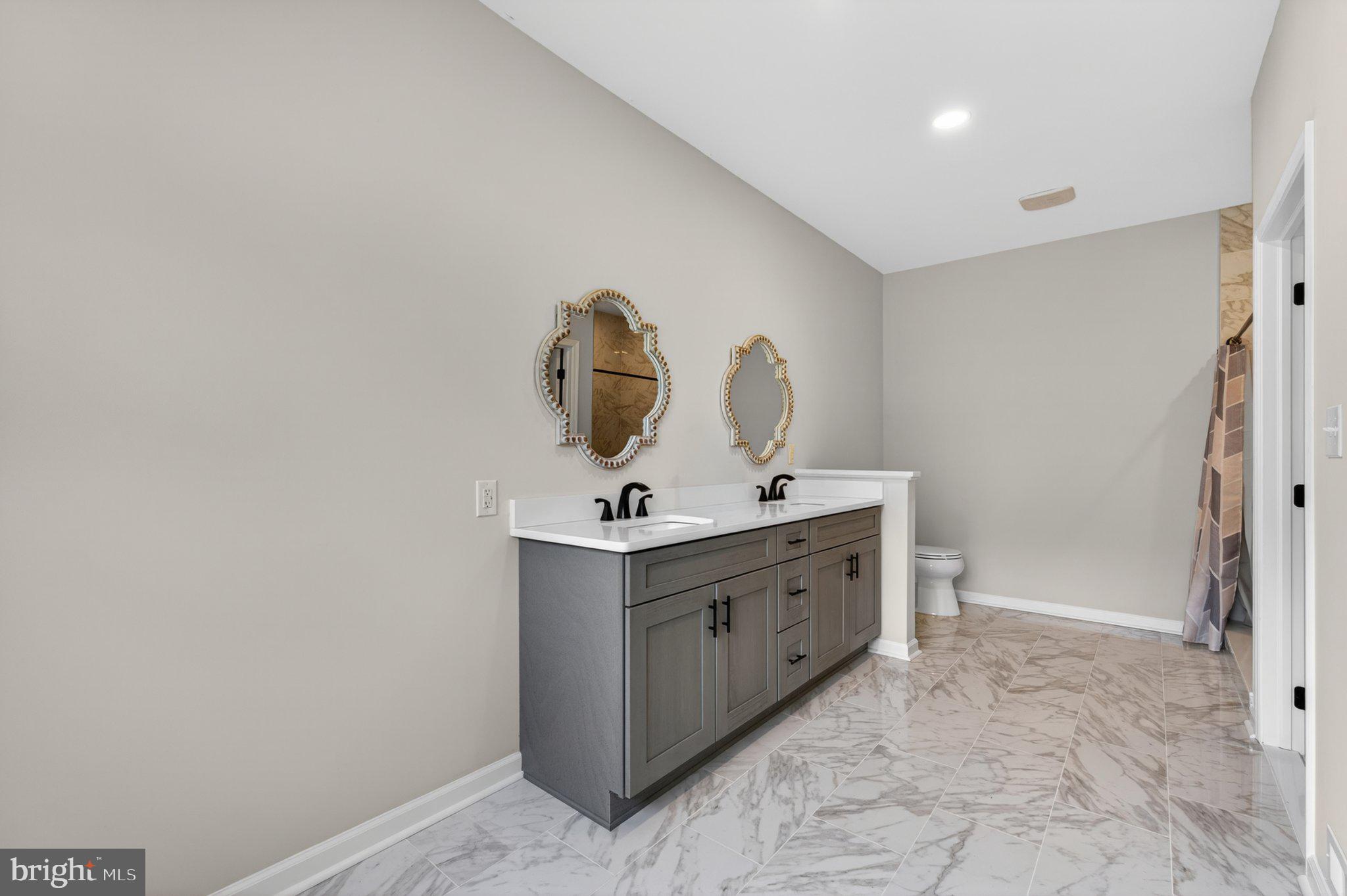 836 Hardingville Road Monroeville, NJ 08343 - Photo 28 of 58 Sleek modern bathroom with elegance.