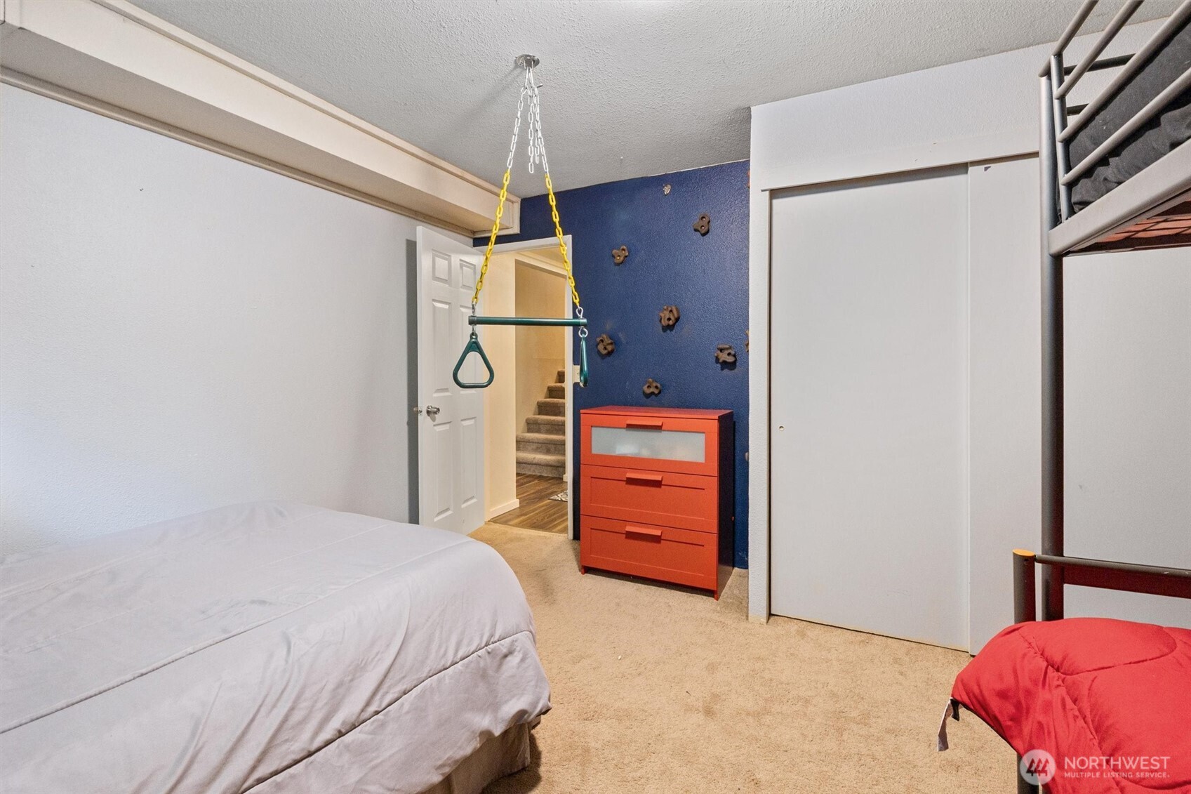 19833 95th Avenue Northeast Bothell, WA 98011 - Photo 28 of 39 a bedroom with a bed and a dresser