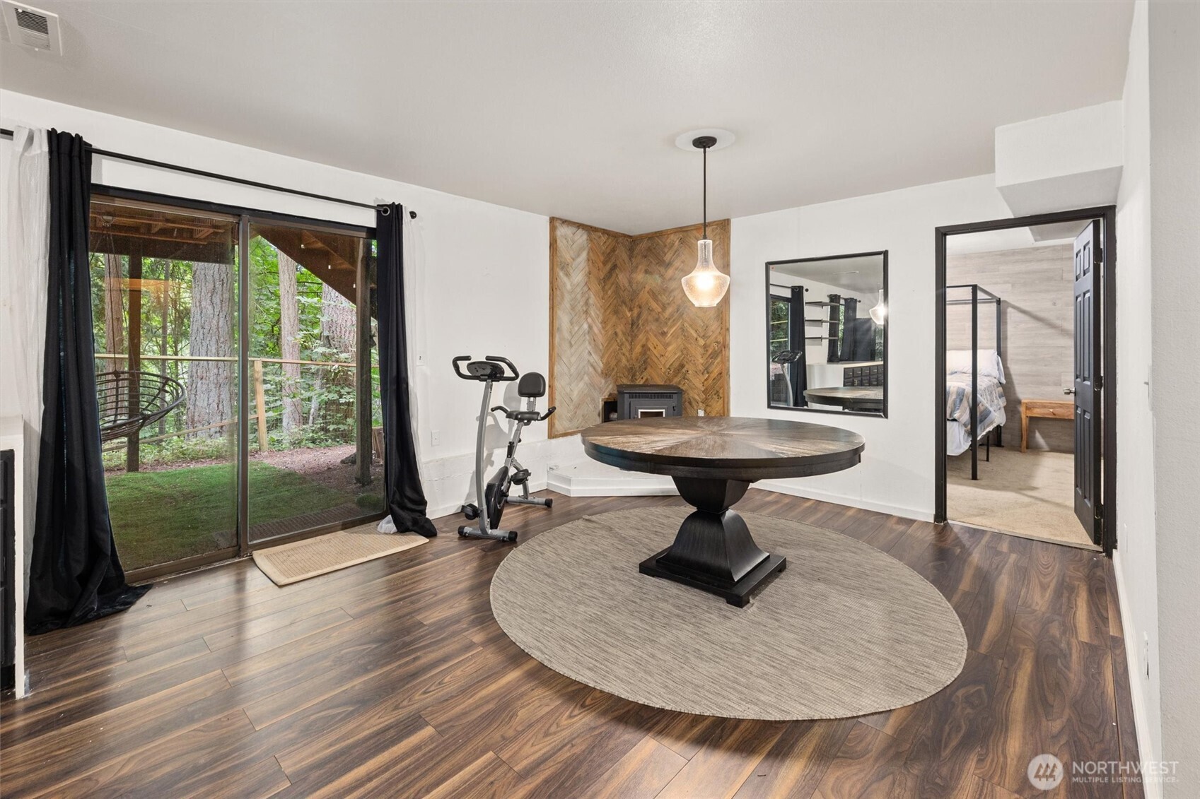 19833 95th Avenue Northeast Bothell, WA 98011 - Photo 30 of 39 a room with lots of furniture and a chandelier