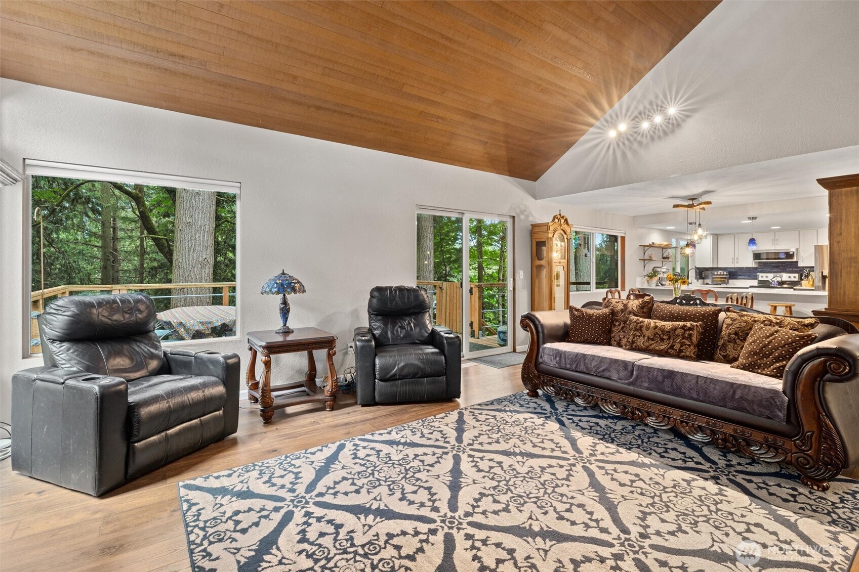 19833 95th Avenue Northeast Bothell, WA 98011 - Photo 10 of 39 a living room with furniture and a rug