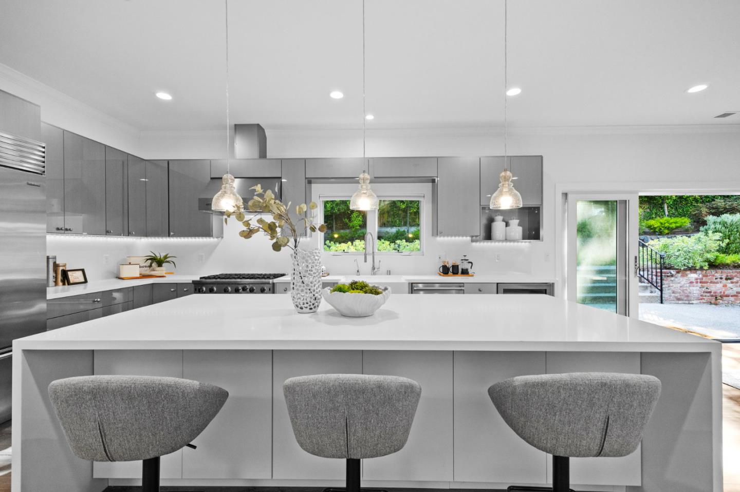 415 El Centro Road Hillsborough, CA 94010 - Photo 11 of 60 a kitchen with stainless steel appliances granite countertop a sink and a refrigerator