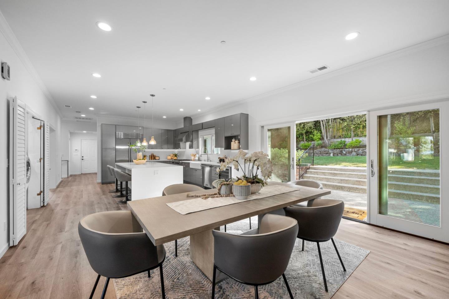 415 El Centro Road Hillsborough, CA 94010 - Photo 14 of 60 a dining room with furniture and wooden floor