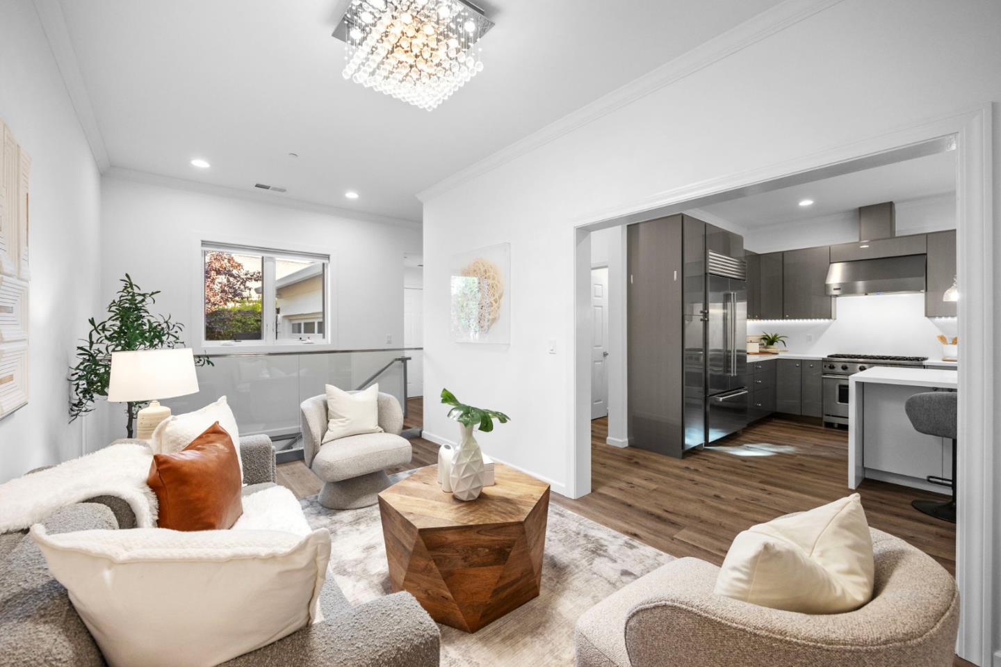 415 El Centro Road Hillsborough, CA 94010 - Photo 17 of 60 a living room with furniture and a view of kitchen