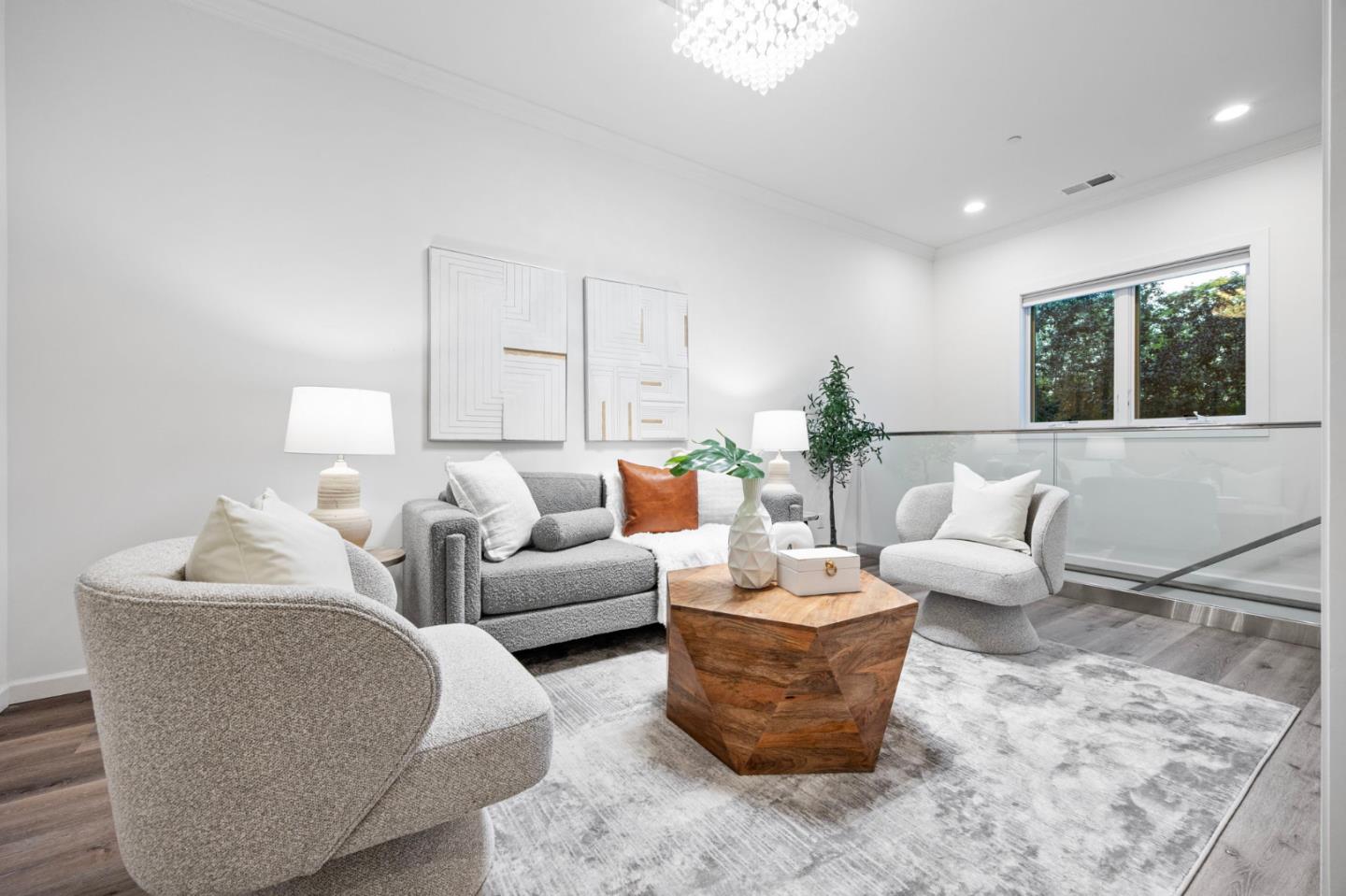 415 El Centro Road Hillsborough, CA 94010 - Photo 18 of 60 a living room with furniture potted plant and a window