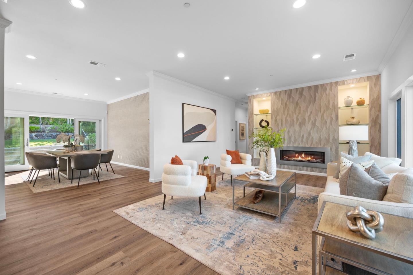 415 El Centro Road Hillsborough, CA 94010 - Photo 19 of 60 a living room with fireplace furniture and a wooden floor