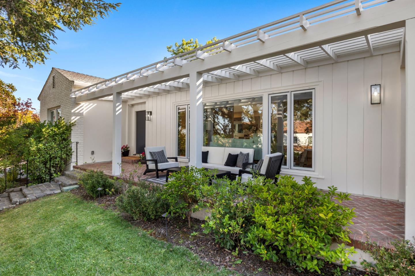 415 El Centro Road Hillsborough, CA 94010 - Photo 2 of 60 a view of a house with backyard and sitting area