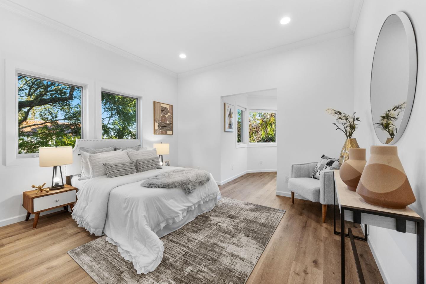 415 El Centro Road Hillsborough, CA 94010 - Photo 30 of 60 a bedroom with a bed and wooden floor