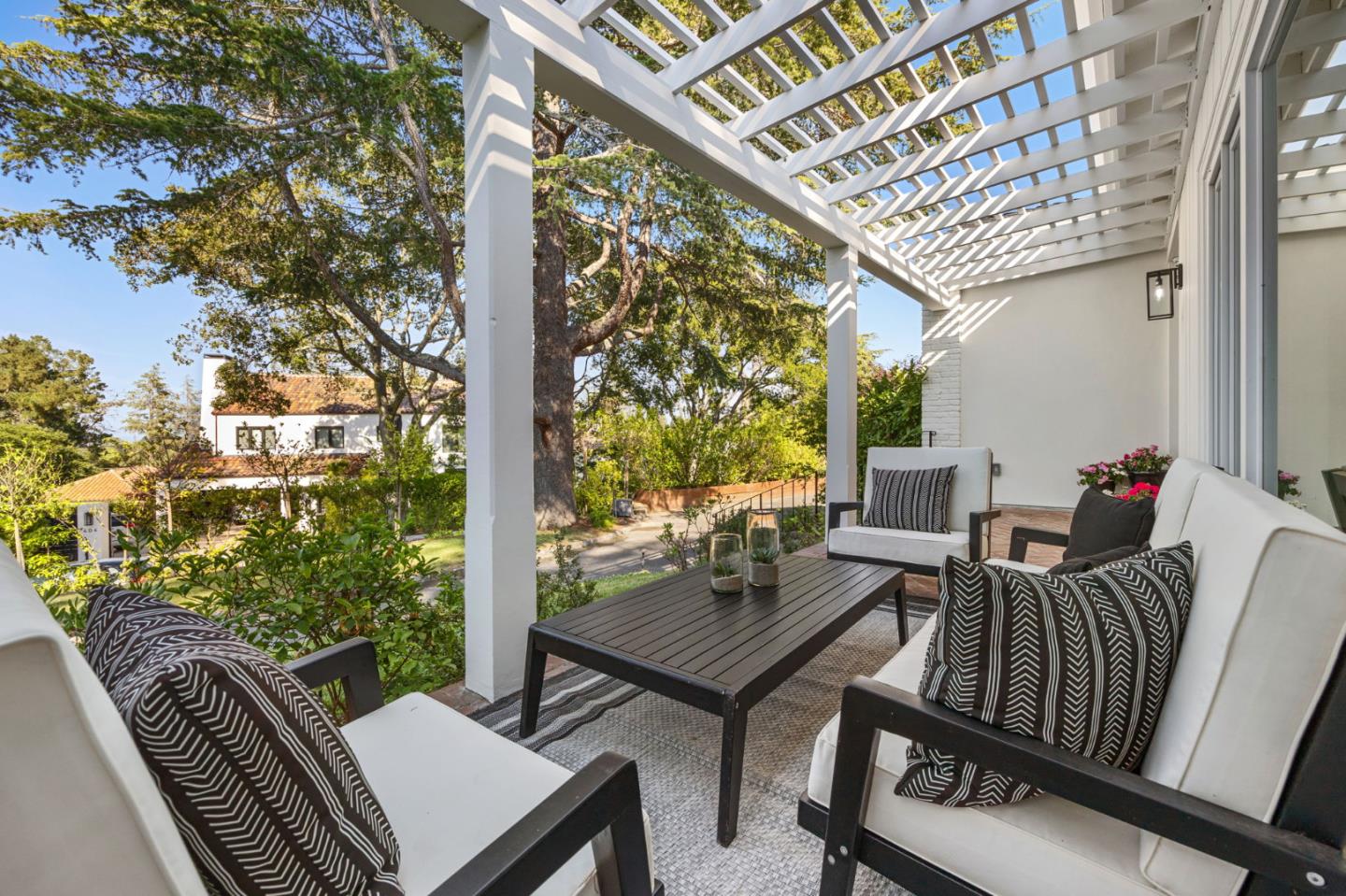 415 El Centro Road Hillsborough, CA 94010 - Photo 3 of 60 a view of balcony with wooden floor and outdoor seating